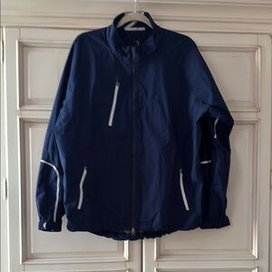Zero Restrictions Blue Golf Windbreaker with Reflective Elements